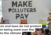 Across the U.S., people are calling for companies to pay for the damage they have done to the environment. Alex Kent/AFP via Getty Images